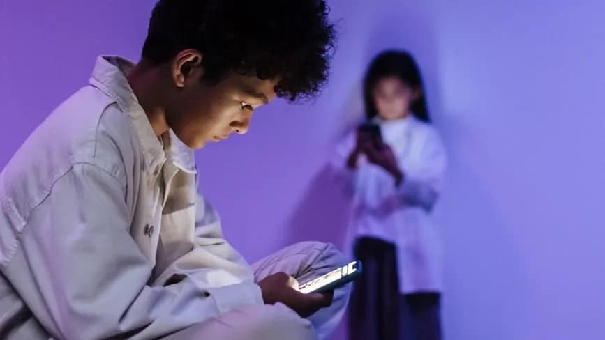 kids looking at phones