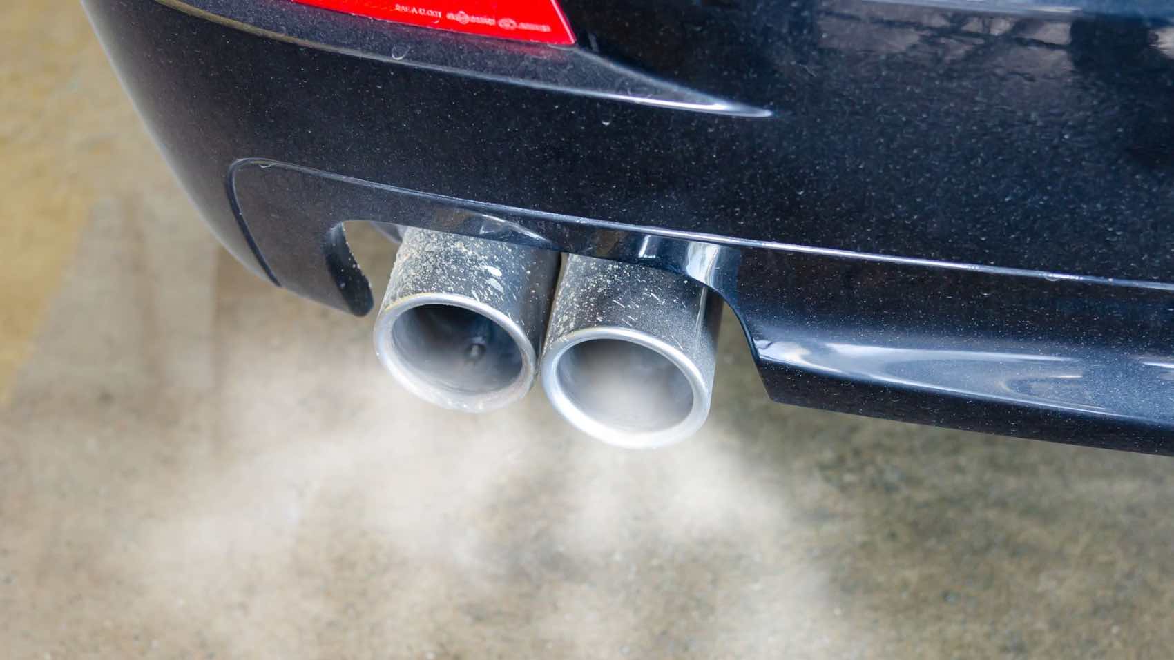Car exhaust emitting white smoke