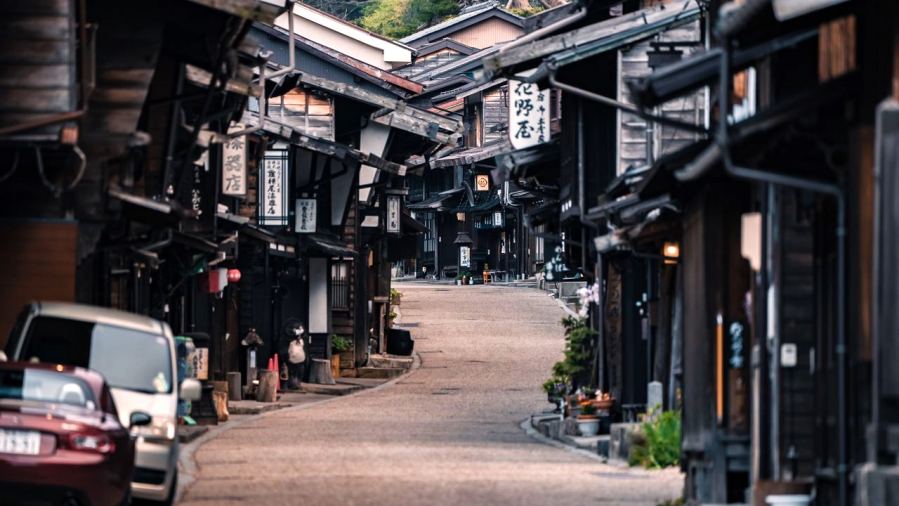 Scenic view of a traditional Japanese street lined with wooden buildings in Shiojiri, Nagano.